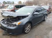 ✅ 2006 Scion tC • VIN: JTKDE177560085477 • Lot: 41525375. Listed on IAAI with 134,397 mi. Free auction sales archive from the USA and detailed vehicle history report at DreamBid. Image 2.