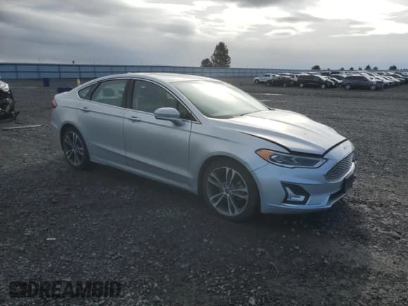✅ 2019 Ford Fusion Titanium • VIN: 3FA6P0D95KR222105 • Lot: 86514025. Listed on Copart with 70,147 mi. Free auction sales archive from the USA and detailed vehicle history report at DreamBid. Image 4.