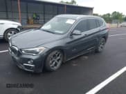 ✅ 2016 BMW X1 xDrive28i • VIN: WBXHT3C36G5E49901 • Lot: 43302561. Listed on IAAI with 114,183 mi. Free auction sales archive from the USA and detailed vehicle history report at DreamBid. Image 2.
