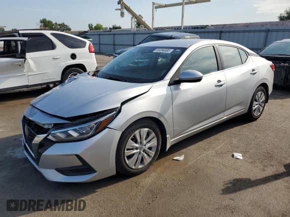 ✅ 2022 Nissan Sentra S • VIN: 3N1AB8BV0NY282307 • Лот: 69396885. Опубликован ранее на Copart с пробегом 46 577 миль. Бесплатный доступ к архиву аукционных продаж из США и подробный отчёт об истории автомобиля на DreamBid. Изображение 1.