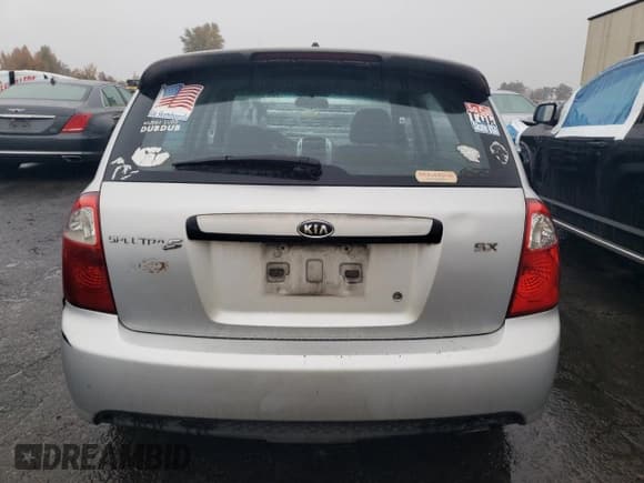 ✅ 2007 Kia Spectra • VIN: KNAFE161775001626 • Лот: 85408365. Опубликован ранее на Copart с пробегом 250 821 миль. Бесплатный доступ к архиву аукционных продаж из США и подробный отчёт об истории автомобиля на DreamBid. Изображение 6.