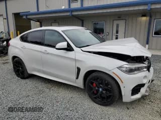 ✅ 2017 BMW X6 M • VIN: 5YMKW8C30H0U72441 • Lot: 79940744. Listed on Copart with 56,779 mi. Free auction sales archive from the USA and detailed vehicle history report at DreamBid. Image 4.