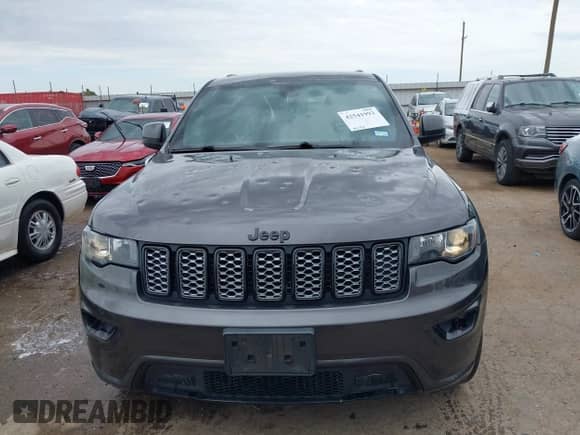 2019 Jeep Grand Cherokee Altitude with VIN 1C4RJFAG6KC703610, listed as a IAAI auction lot 42541993 with 92,154 mi miles and . Bid and sale history available at DreamBid. Image 12.