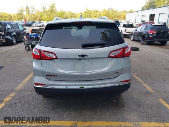 2021 Chevrolet Equinox Premier with VIN 2GNAXXEV8M6164551, listed as a IAAI auction lot 43130369 with 35,768 mi miles and . Bid and sale history available at DreamBid. Image 17.