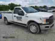 2019 Ford F-150 XL with VIN 1FTNF1C40KKD89058, listed as a Copart auction lot 63053485 with 233,103 mi miles and Salvage title. Bid and sale history available at DreamBid. Image 4.