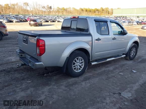 2016 Nissan Frontier S z VIN 1N6AD0EV0GN767161, wystawiony jako IAAI lot #41566094 z przebiegiem 99 638 mil mil oraz . Historia ofert i sprzedaży dostępna na DreamBid. Obrazek 4.