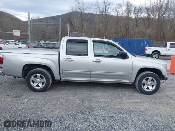 2010 Chevrolet Colorado 1LT z VIN 1GCDSCDE6A8133142, wystawiony jako IAAI lot #41843196 z przebiegiem 157 315 mil mil oraz . Historia ofert i sprzedaży dostępna na DreamBid. Obrazek 13.