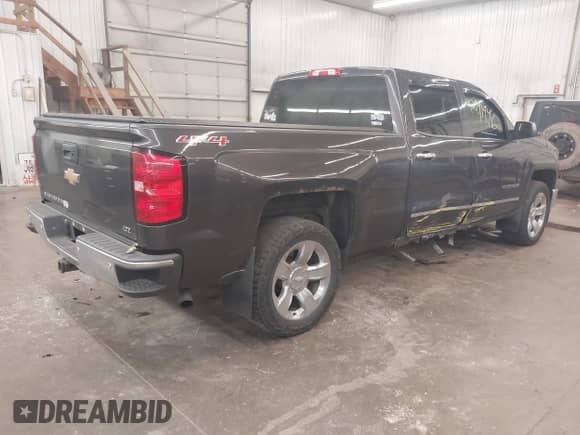 2014 Chevrolet Silverado 1500 LTZ z VIN 3GCUKSEJ5EG296189, wystawiony jako IAAI lot #42941946 z przebiegiem 196 524 mil mil oraz . Historia ofert i sprzedaży dostępna na DreamBid. Obrazek 4.