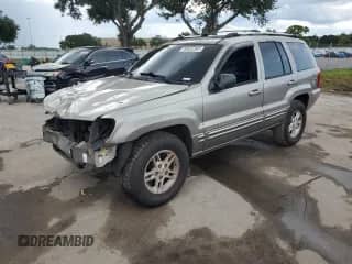 1999 Jeep Grand Cherokee Limited с VIN 1J4GW68N0XC685779, выставлен на аукционе Copart как лот 68852365 с пробегом 148 892 миль миль и Списание • Salvage title. История ставок и продаж доступна на DreamBid. Изображение 1.