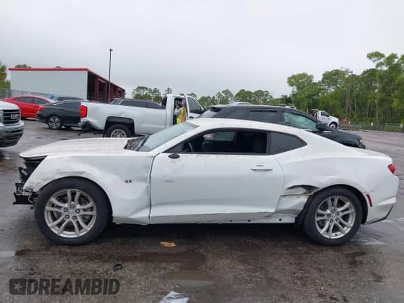 2021 Chevrolet Camaro 1LT с VIN 1G1FB1RX4M0142120, выставлен на аукционе IAAI как лот 41394658 с пробегом 25 477 миль миль и . История ставок и продаж доступна на DreamBid. Изображение 14.