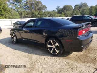 2014 Dodge Charger SXT with VIN 2C3CDXHGXEH369015, listed as a Copart auction lot 71602295 with 201,182 mi miles and Salvage title. Bid and sale history available at DreamBid. Image 2.