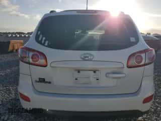 2012 Hyundai Santa Fe GLS с VIN 5XYZG4AG8CG152144, выставлен на аукционе Copart как лот 86626055 с пробегом 122 220 миль миль и На запчасти • Non repairable. История ставок и продаж доступна на DreamBid. Изображение 6.