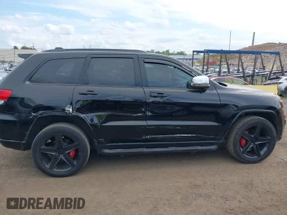 2018 Jeep Grand Cherokee Sterling with VIN 1C4RJFBG6JC107894, listed as a IAAI auction lot 43099806 with 88,635 mi miles and . Bid and sale history available at DreamBid. Image 13.