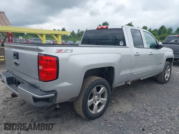 2017 Chevrolet Silverado 1500 LT with VIN 1GCVKREC5HZ328321, listed as a IAAI auction lot 42818538 with 137,263 mi miles and . Bid and sale history available at DreamBid. Image 4.