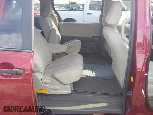 2012 Toyota Sienna with VIN 5TDZK3DC9CS254637, listed as a IAAI auction lot 42476641 with 257,860 mi miles and . Bid and sale history available at DreamBid. Image 8.