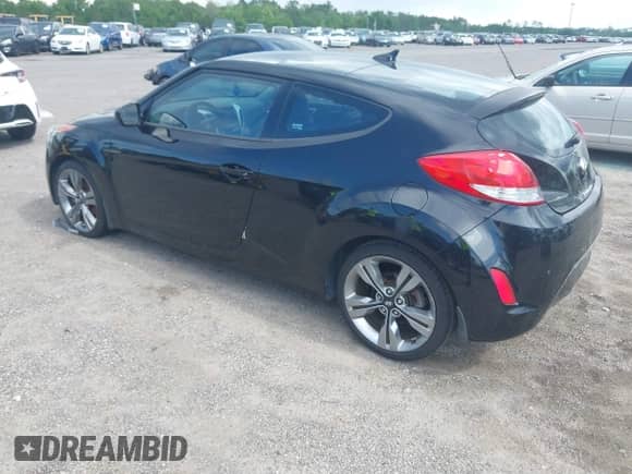 2015 Hyundai Veloster with VIN KMHTC6AD9FU235289, listed as a IAAI auction lot 42244334 with 117,082 mi miles and . Bid and sale history available at DreamBid. Image 3.