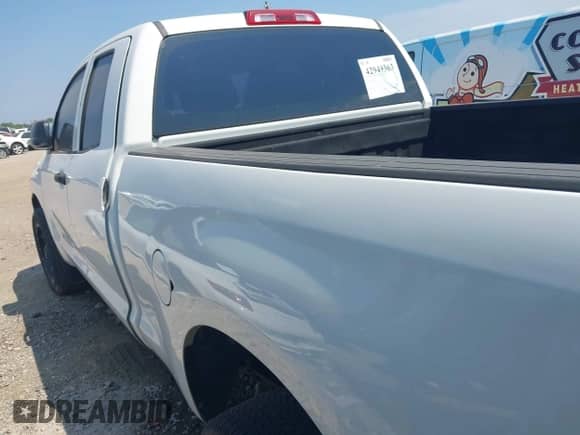 2012 Toyota Tundra z VIN 5TFRU5F18CX026656, wystawiony jako IAAI lot #42949363 z przebiegiem 294 338 mil mil oraz . Historia ofert i sprzedaży dostępna na DreamBid. Obrazek 3.