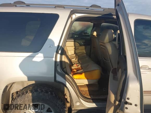 2007 Chevrolet Tahoe LT with VIN 1GNFC13J47R162173, listed as a IAAI auction lot 43076743 with 252,410 mi miles and . Bid and sale history available at DreamBid. Image 8.