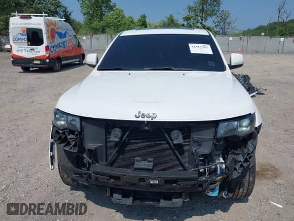 2020 Jeep Grand Cherokee Altitude with VIN 1C4RJFAG9LC196252, listed as a IAAI auction lot 42413963 with 100,856 mi miles and . Bid and sale history available at DreamBid. Image 12.