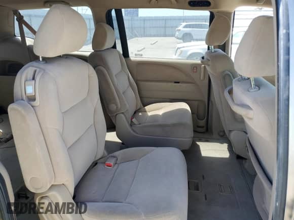 2005 Honda Odyssey LX with VIN 5FNRL38295B101522, listed as a Copart auction lot 65648685 with 148,852 mi miles and Salvage title. Bid and sale history available at DreamBid. Image 11.