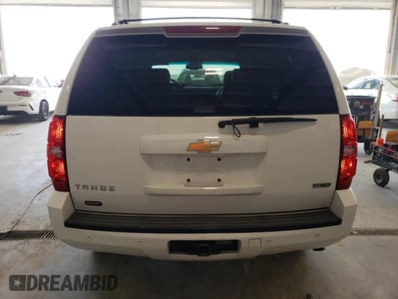 2010 Chevrolet Tahoe LT с VIN 1GNUKBE06AR210350, выставлен на аукционе Copart как лот 69674835 с пробегом 193 628 миль миль и Списание • Salvage title. История ставок и продаж доступна на DreamBid. Изображение 6.