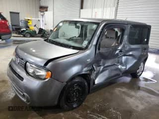 2009 Nissan Cube SL с VIN JN8AZ28R19T112749, выставлен на аукционе Copart как лот 56135965 с пробегом 122 579 миль миль и Списание • Salvage title. История ставок и продаж доступна на DreamBid. Изображение 1.