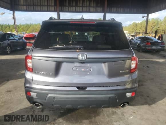 2021 Honda Passport Touring с VIN 5FNYF7H97MB012926, выставлен на аукционе Copart как лот 79346014 с пробегом 59 096 миль миль и Списание • Salvage title. История ставок и продаж доступна на DreamBid. Изображение 6.