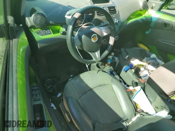 2014 Chevrolet Spark LS с VIN KL8CB6S96EC584036, выставлен на аукционе Copart как лот 71302535 с пробегом 83 657 миль миль и Списание • Salvage title. История ставок и продаж доступна на DreamBid. Изображение 8.