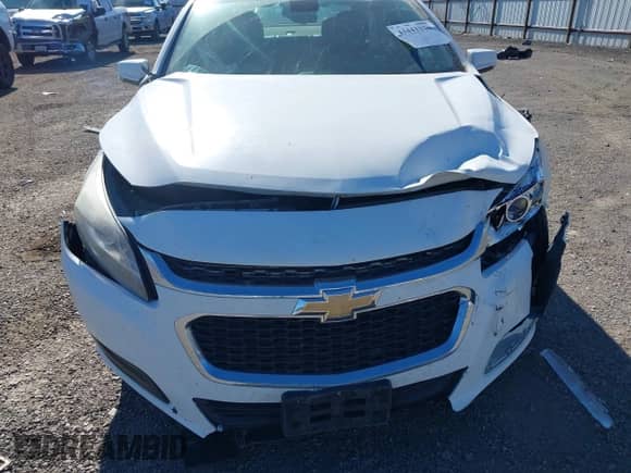 2015 Chevrolet Malibu LT z VIN 1G11C5SL6FF271577, wystawiony jako IAAI lot #43441330 z przebiegiem 159 952 mil mil oraz . Historia ofert i sprzedaży dostępna na DreamBid. Obrazek 6.