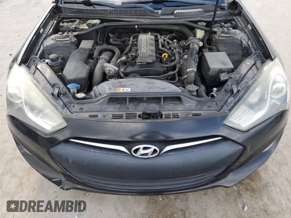 2014 Hyundai Genesis Coupe 2.0T z VIN KMHHT6KD6EU119213, wystawiony jako Copart lot #82108555 z przebiegiem 118 207 mil mil oraz Szkoda całkowita • Salvage title. Historia ofert i sprzedaży dostępna na DreamBid. Obrazek 11.