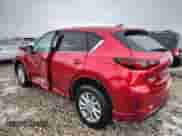 2024 Mazda CX-5 S Select z VIN JM3KFBBL8R0451210, wystawiony jako Copart lot #84469875 z przebiegiem 3 795 mil mil oraz Szkoda całkowita • Salvage title. Historia ofert i sprzedaży dostępna na DreamBid. Obrazek 2.