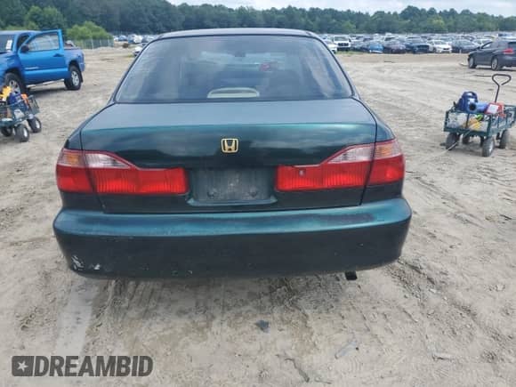 2000 Honda Accord EX with VIN JHMCG566XYC013980, listed as a Copart auction lot 65272695 with Not provided miles and Salvage title. Bid and sale history available at DreamBid. Image 6.