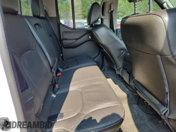 2017 Nissan Frontier Pro-4X with VIN 1N6DD0EV1HN717674, listed as a Copart auction lot 69540635 with 92,630 mi miles and Salvage title. Bid and sale history available at DreamBid. Image 10.