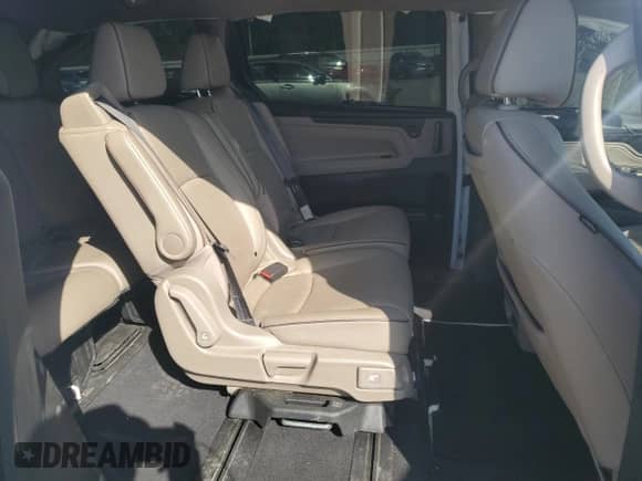 2021 Honda Odyssey Elite с VIN 5FNRL6H97MB009998, выставлен на аукционе Copart как лот 53475215 с пробегом Не указан миль и На запчасти • Non repairable. История ставок и продаж доступна на DreamBid. Изображение 11.