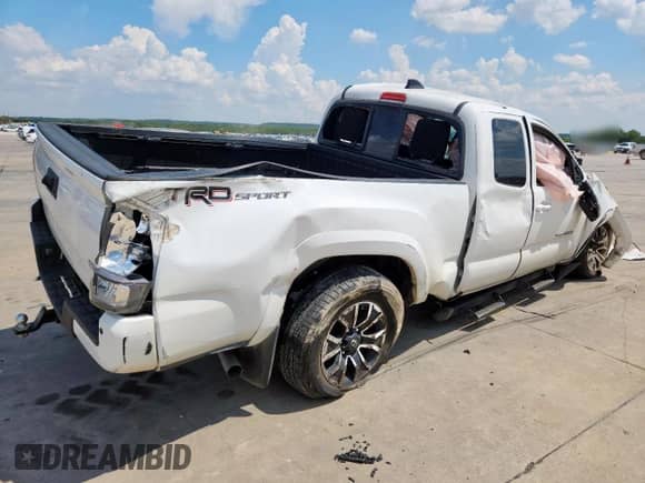 2023 Toyota Tacoma SR z VIN 3TYRZ5CN5PT033640, wystawiony jako Copart lot #69745075 z przebiegiem 14 471 mil mil oraz Szkoda całkowita • Salvage title. Historia ofert i sprzedaży dostępna na DreamBid. Obrazek 3.