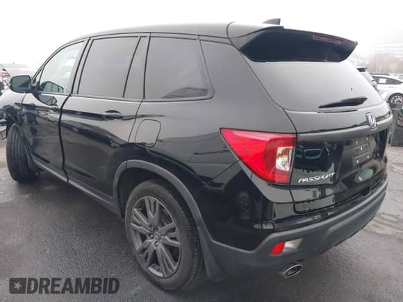 2021 Honda Passport EX-L with VIN 5FNYF7H5XMB013923, listed as a IAAI auction lot 41669295 with 42,969 mi miles and . Bid and sale history available at DreamBid. Image 3.