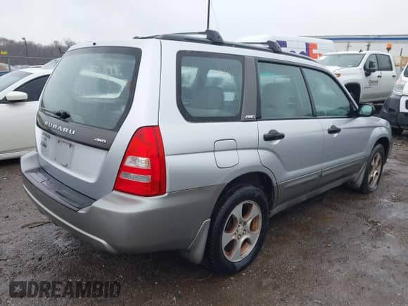 2004 Subaru Forester XS with VIN JF1SG65624H733099, listed as a IAAI auction lot 41966016 with 227,052 mi miles and . Bid and sale history available at DreamBid. Image 4.
