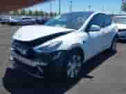2022 Tesla Model Y Long Range z VIN 7SAYGDEE3NF363270, wystawiony jako IAAI lot #42708934 z przebiegiem 39 994 mil mil oraz . Historia ofert i sprzedaży dostępna na DreamBid. Obrazek 20.