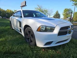 2012 Dodge Charger SE with VIN 2C3CDXBG2CH297135, listed as a Copart auction lot 86074465 with 185,428 mi miles and Clean title. Bid and sale history available at DreamBid. Image 1.