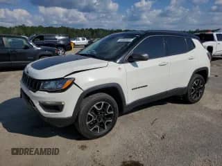 2021 Jeep Compass Trailhawk with VIN 3C4NJDDB4MT600650, listed as a Copart auction lot 65980885 with 70,160 mi miles and Salvage title. Bid and sale history available at DreamBid. Image 1.