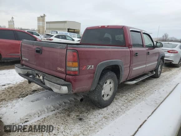 2005 GMC Sierra 1500 SLE with VIN 2GTEK13T951234399, listed as a Copart auction lot 45298675 with 79,069 mi miles and Salvage title. Bid and sale history available at DreamBid. Image 3.