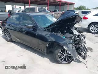 2022 BMW 3 Series 330i with VIN 3MW5R1J0XN8C41588, listed as a IAAI auction lot 42576394 with Not provided miles and . Bid and sale history available at DreamBid. Image 1.