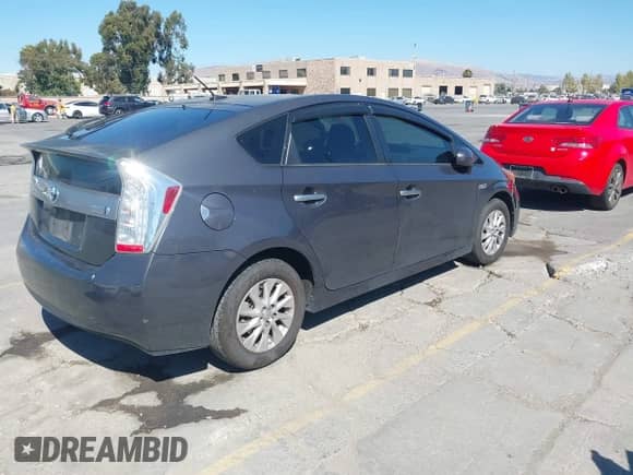 2012 Toyota Prius with VIN JTDKN3DP5C3013171, listed as a IAAI auction lot 42881976 with 215,279 mi miles and . Bid and sale history available at DreamBid. Image 4.