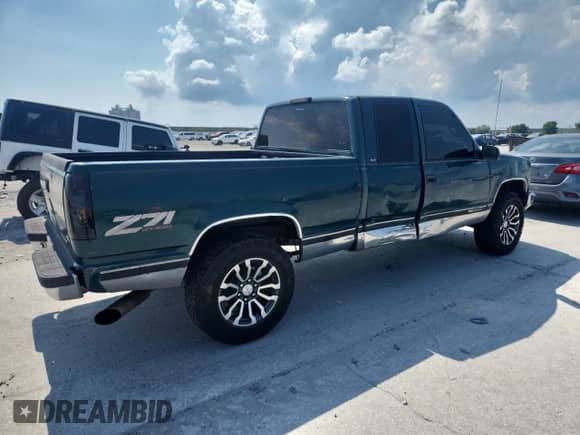 1997 GMC Sierra 1500 с VIN 2GTEK19R3V1554913, выставлен на аукционе Copart как лот 80281485 с пробегом 246 907 миль миль и Списание • Salvage title. История ставок и продаж доступна на DreamBid. Изображение 3.