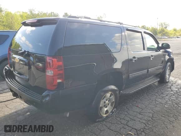 2013 Chevrolet Suburban LT с VIN 1GNSKJE79DR235536, выставлен на аукционе Copart как лот 41865805 с пробегом 231 576 миль миль и Чистый • Clean title. История ставок и продаж доступна на DreamBid. Изображение 3.