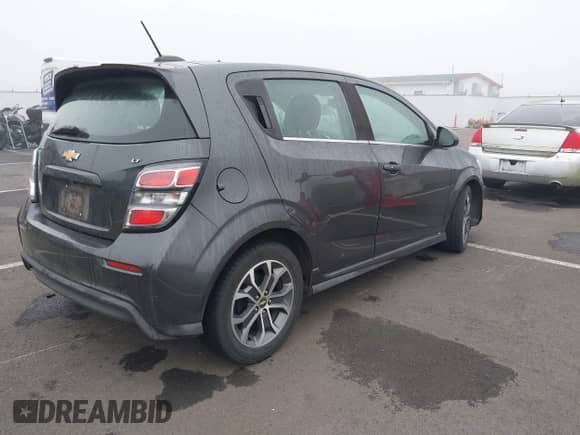 2017 Chevrolet Sonic LT z VIN 1G1JD6SG1H4164926, wystawiony jako IAAI lot #43363829 z przebiegiem 103 907 mil mil oraz . Historia ofert i sprzedaży dostępna na DreamBid. Obrazek 4.
