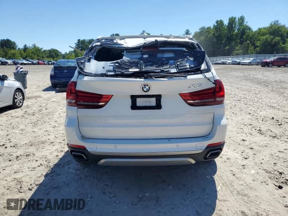 2018 BMW X5 xDrive35i с VIN 5UXKR0C50J0X89711, выставлен на аукционе Copart как лот 69556245 с пробегом 61 103 миль миль и Списание • Salvage title. История ставок и продаж доступна на DreamBid. Изображение 6.