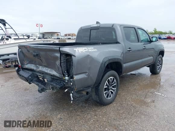 2021 Toyota Tacoma SR5 с VIN 5TFAZ5CNXMX097509, выставлен на аукционе IAAI как лот 41889399 с пробегом 81 598 миль миль и . История ставок и продаж доступна на DreamBid. Изображение 4.