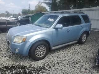 2008 Mercury Mariner Premier with VIN 4M2CU97138KJ12158, listed as a Copart auction lot 67723145 with 132,629 mi miles and Salvage title. Bid and sale history available at DreamBid. Image 1.
