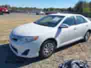 2014 Toyota Camry L with VIN 4T4BF1FKXER340618, listed as a IAAI auction lot 43476972 with 202,502 mi miles and . Bid and sale history available at DreamBid. Image 2.